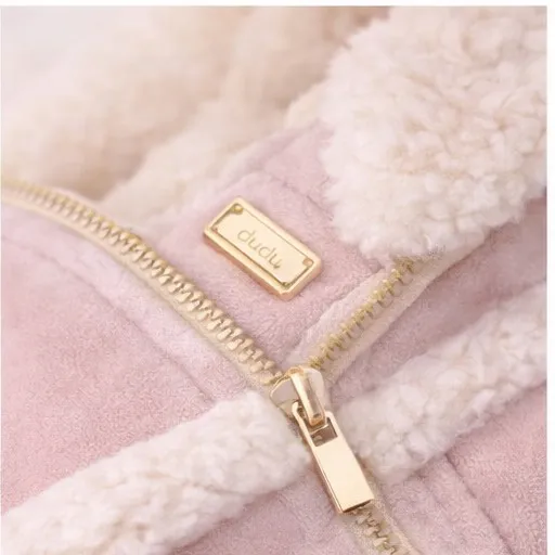 Close detail of the rose coat hardware and trim